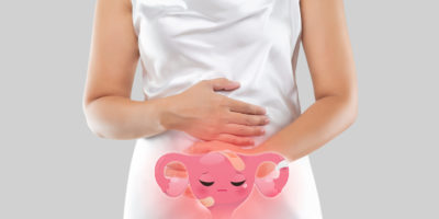 Vaginal discharge and vaginal odor of a female. Leucorrhoea. Illustration of the uterus smelly is on the woman's body.